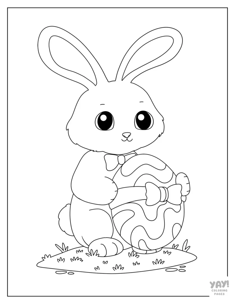 Easter bunny holding egg with bow