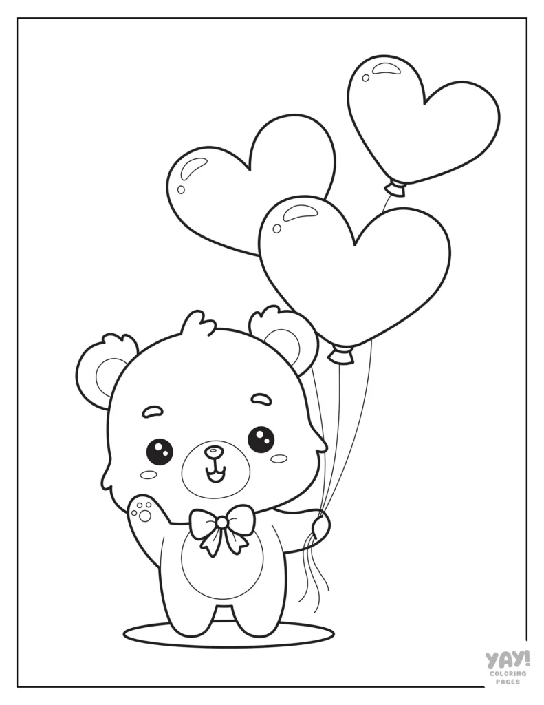 Teddy bear holding heart shaped balloon